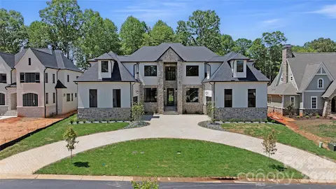 Previous build of same house plan.  Front Elevation.  Brick, stone, colors can be changed