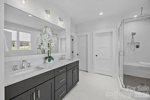 Luxurious and spacious Primary BA- dual vanity, walk in closet, soaking tub, walk-in shower