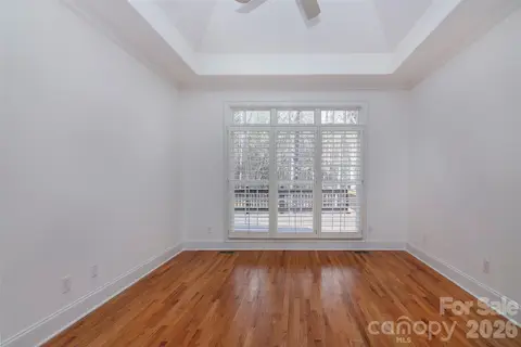Triple windows - view of deck/trees - private entry off foyer to separate door to primary bedroom/ensuite bath with jacuzzi (new motor)/separate tiled shower & xtra large closet.