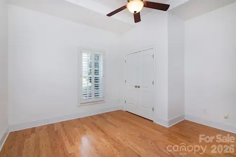 Basement bedroom/dbl doors to large closet and hall FBA just by entry door - note tray ceiling and window view!