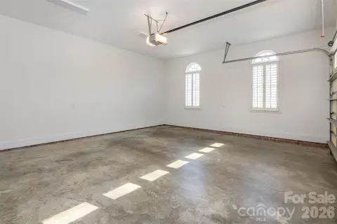 Oversized gar - gas water heater in garage, exterior keypad, 18' door,  brick steps to laundry/mud room!