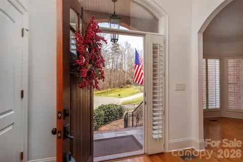 Impressive view from front door - year round view of trees!  Welcome family/friends to your well built custom "forever home".