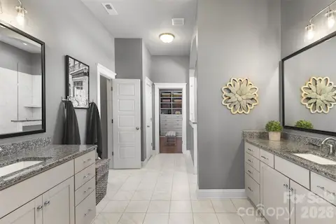 Large primary bathroom with 2 vanities 