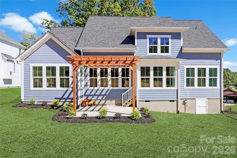 The attention to detail in the exterior design of this beautiful home reflects a commitment to quality and style.