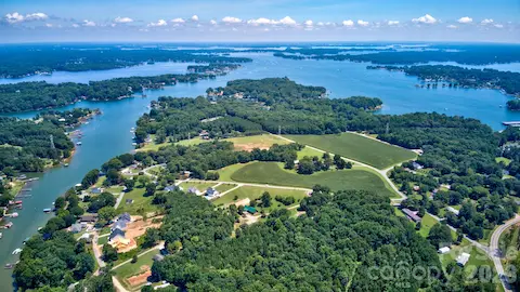 Experience the ultimate lake lifestyle with this impeccably located home, offering direct access to the water and all the wonderful activities that come with it.