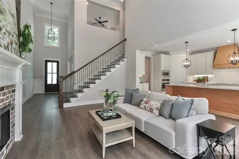 Step inside to a bright, open floor plan with soaring ceilings and abundant natural light.