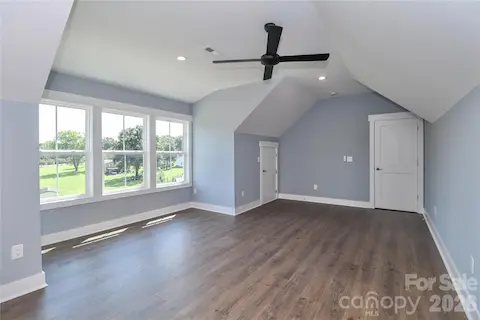 a generously sized bonus room, providing homeowners with a versatile space that can be adapted to meet a wide array of needs and interests.