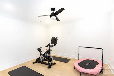 Exercise room with TV outlet at eye level