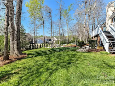Large backyard with mature landscaping