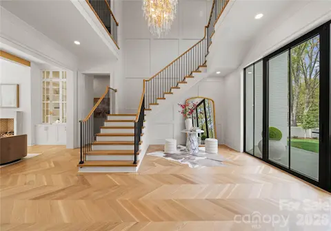 Two story foyer with motion light up stairs