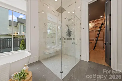 All marble seamless walk-in shower