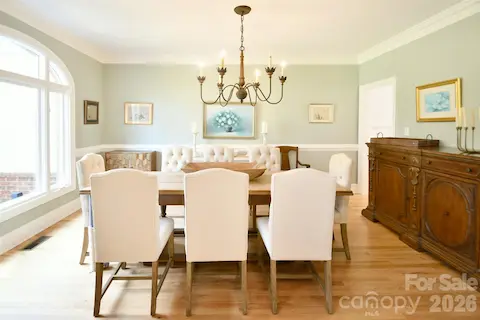 Spacious Dining Room with lots of natural light and beautiful woodwork detail