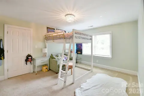 Large Bedroom #1 upstairs with lots of natural light