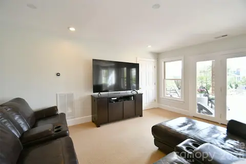 Rec Room in the basement with a walk-out to the backyard