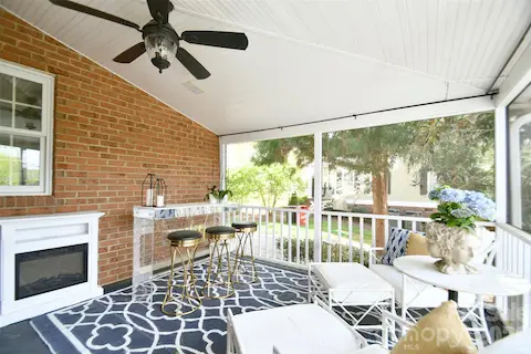 Beautiful screened porch is perfect for entertaining