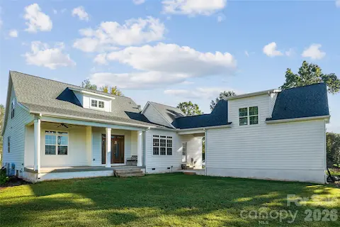 Rearview of home and garage.