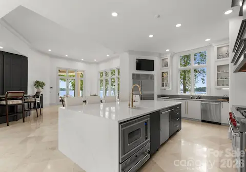 Kitchen open to Living Room and Bar