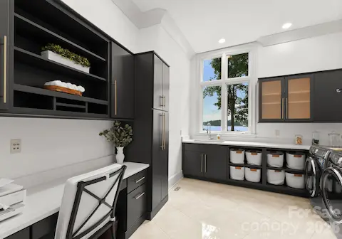 Main Floor Laundry with Desk, Sink and Lake Views