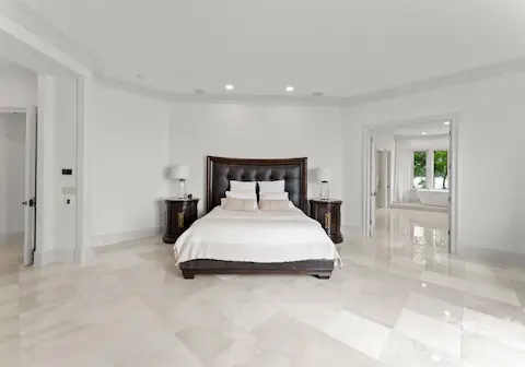 Primary Bedroom with heated marble flooring 22'9" x 21'3"