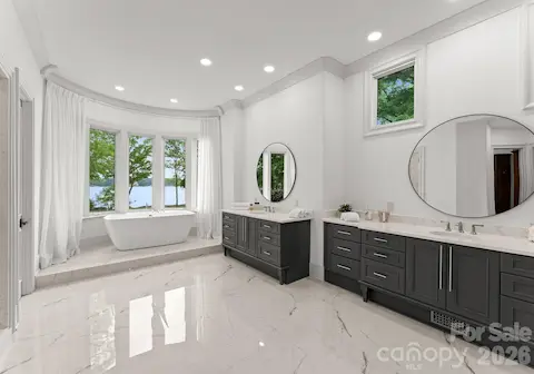 Primary Bath, heated marble floors, separate shower and soaking tub