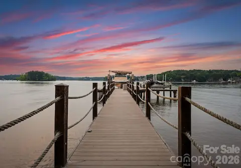 Private Dock with beamless boatlift and jet ski lift