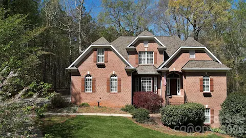 Hidden Forest treed common area adjoins rear of this lot for added privacy.  HF common area across cul-de-sac from this home adds more year round privacy with beauty of even  more trees!!