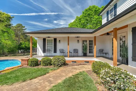 Covered back porch to main bedroom access