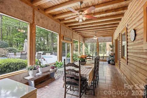Sun Room just off the Great Room with sliding glass doors to the outside oasis.
