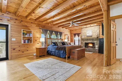 Primary Suite with gas fireplace & with private door to beautiful porch on front of home.