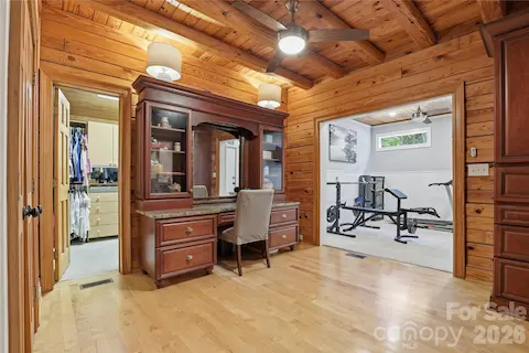 Changing room with walk in closet, 2nd closet and work out room with door that leads to the sun deck on back of home.