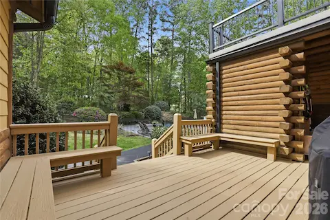Sun porch / deck with doors to kitchen and workout room.