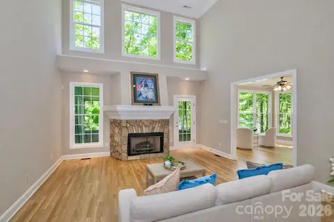 Family room with soaring ceilings & natural light