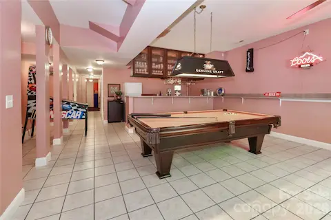 Bar area complete with pool table and pin ball machine