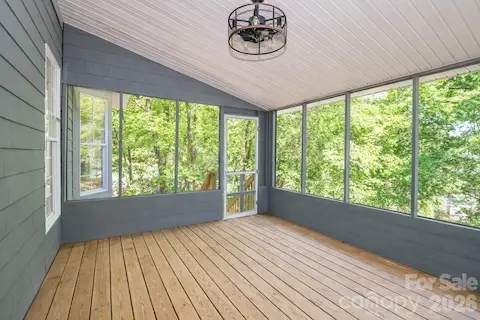 Screened porch off of the family room