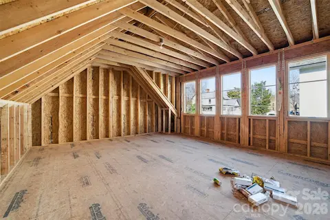 Walk up storage with fixed stairs over the garage with potential for additional HLA.