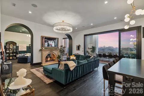 Dual archways lead from the living room into the lounge.