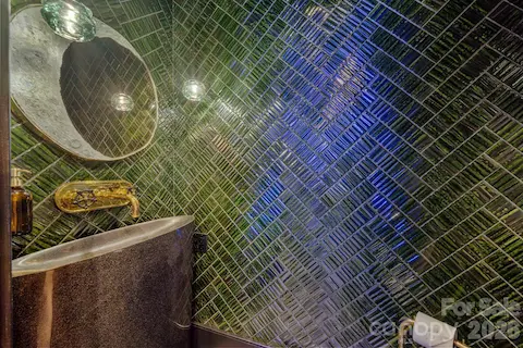 Lunar themed powder bath in the media room.