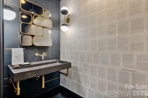 Literary-themed powder bath in front gallery hallway.