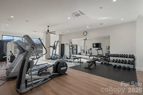 Gym, including free weights & Peloton equipment, located in Bldg 300