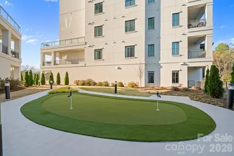 Putting green, on the poolside level.