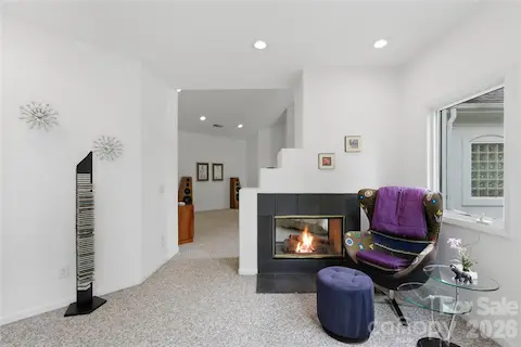 Primary suite sitting area with fireplace