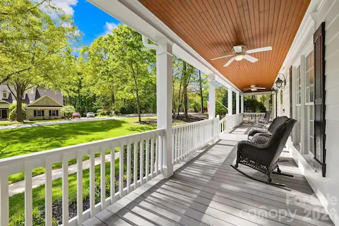 Must see large wrap-around porch - who wouldn't love sipping some sweet tea here?