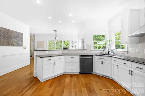 This light and bright kitchen offers plenty of storage.