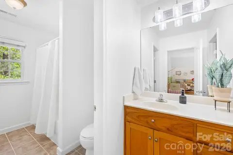 Bathroom 2 connects to bedroom 2 and hallway.