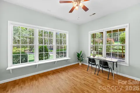 This flex space has been used for home-schooling with French doors. It can also be a private living room for in-laws or guests. It connects to the guest bedroom.