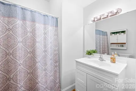 An additional bathroom in the basement just off the family room.