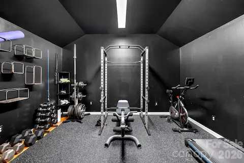 Secluded, distraction-free gym in basement offers natural sound insulation.