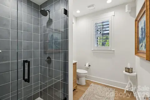 Downstairs bathroom connecting to Study/Guest Bedroom on Main Floor