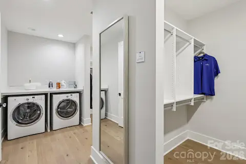 Primary Closet with additional laundry option for Primary