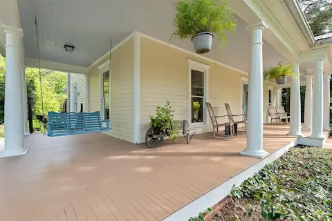 Timeless two-story Colonial Revival featuring a wraparound porch with classical columns and a pedimented entry. Ideally located just steps from Davidson College and all that downtown Davidson has to offer.